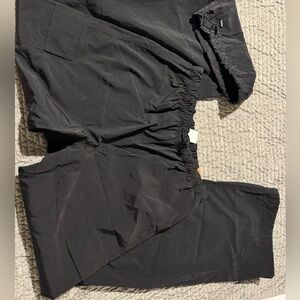 Black parachute pants from pink
